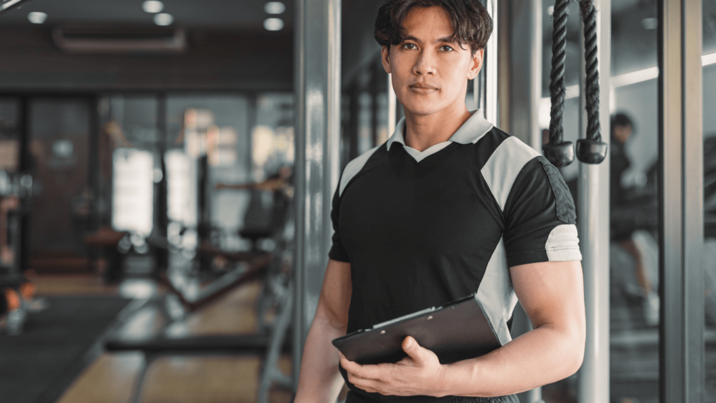 a man standing on the gym