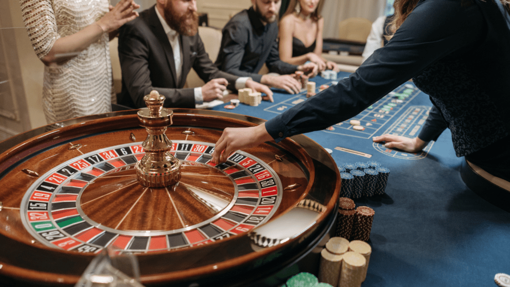 a group of people playing roulette