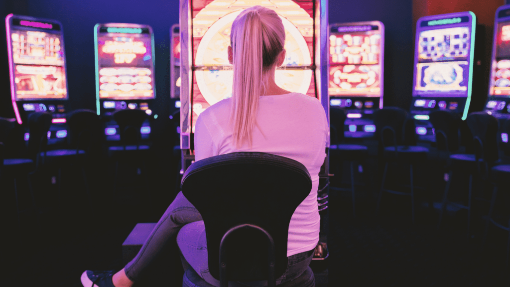 a woman playing slots