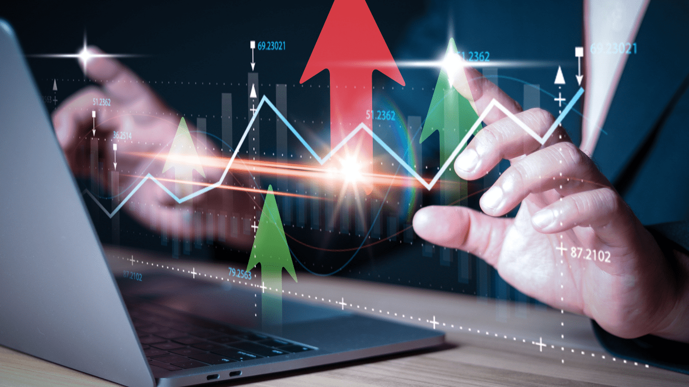 a laptop and graph