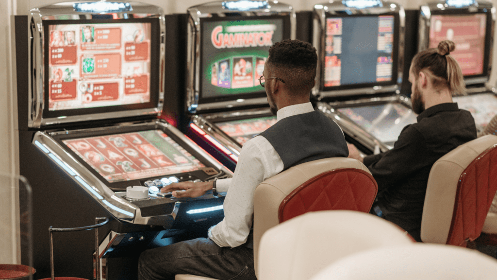 a men playing slots