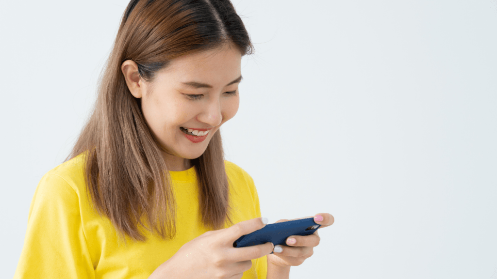 a woman playing cellphone