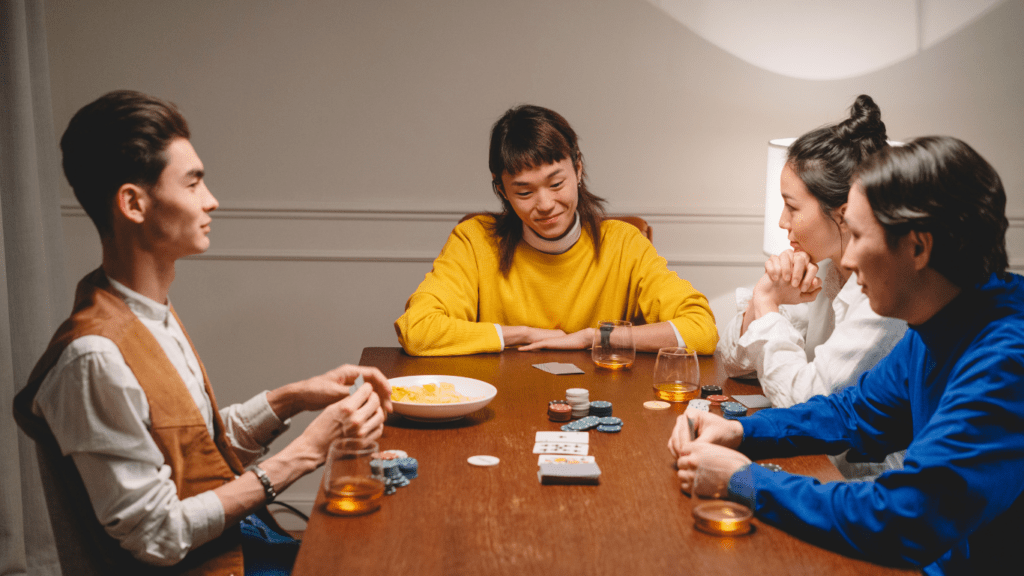 group of friends playing poker