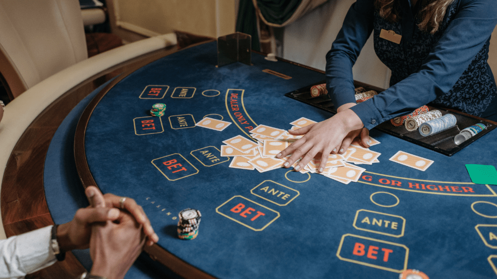 man and woman playing baccarat