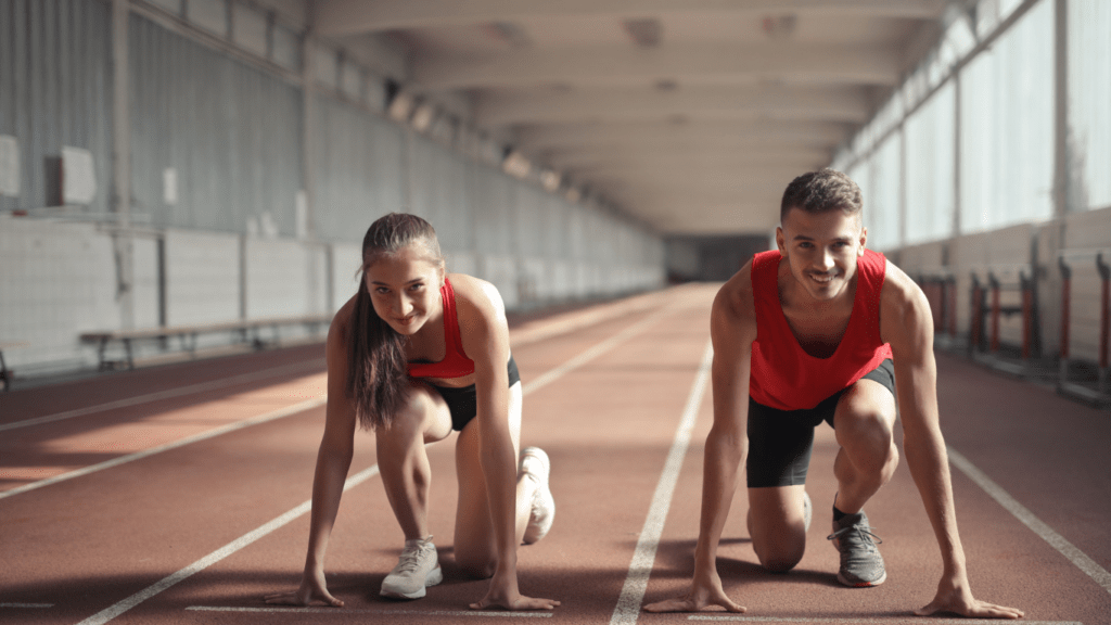 man and woman ready to run